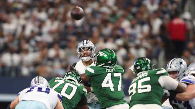 Jets' DE Bryce Huff (47) pressures Dak Prescott